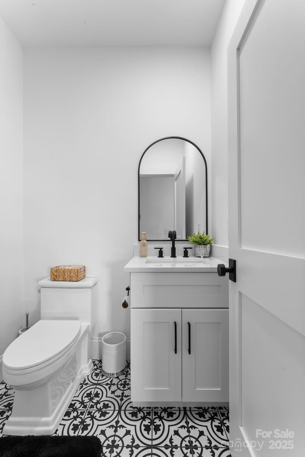 1575 Shinnville Road Cleveland, NC 27013 - Photo 41 of 47 a bathroom with a sink toilet and vanity