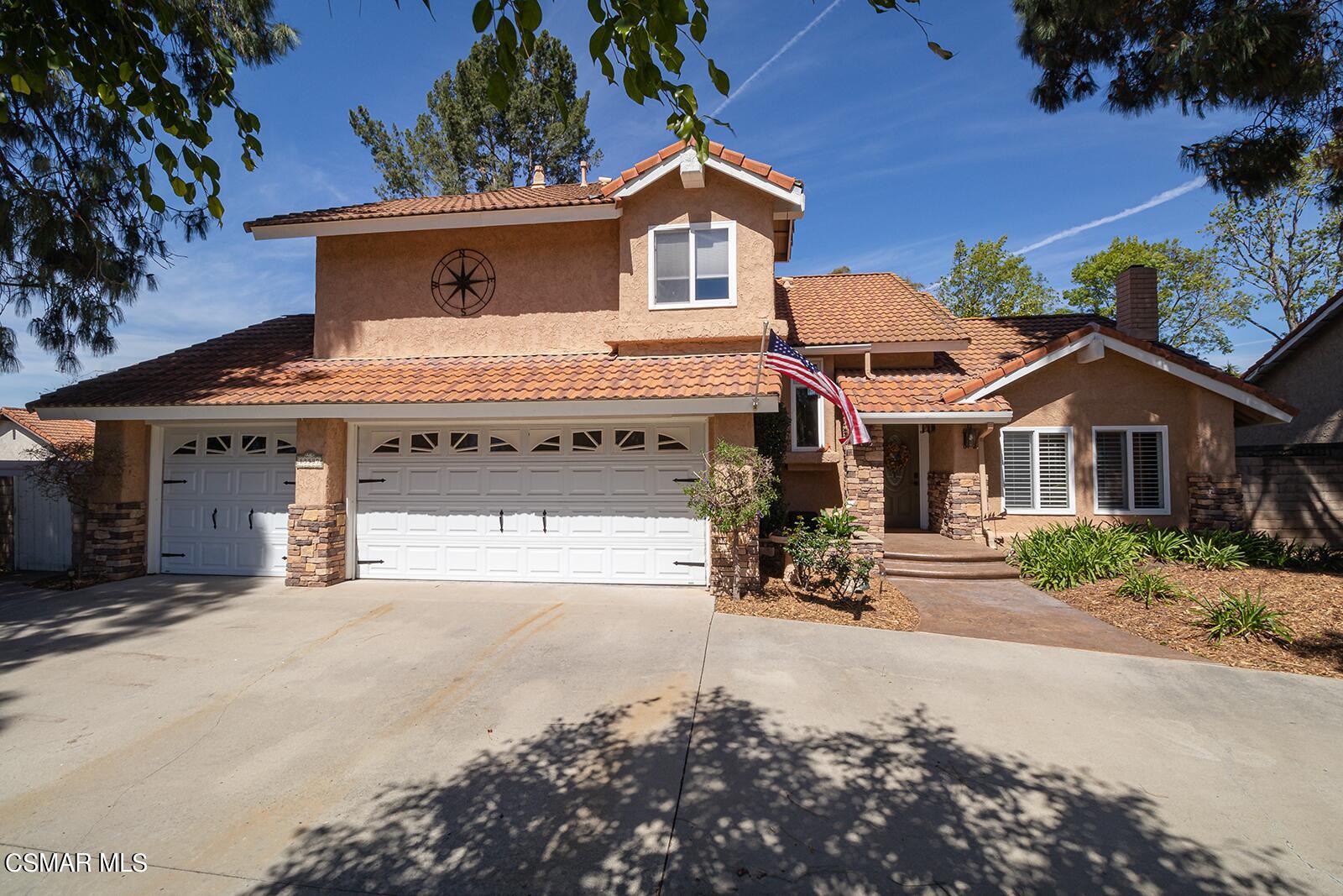 13339 Peach Hill Road Moorpark, CA 93021 - Photo 1 of 45 a front view of a house with a yard