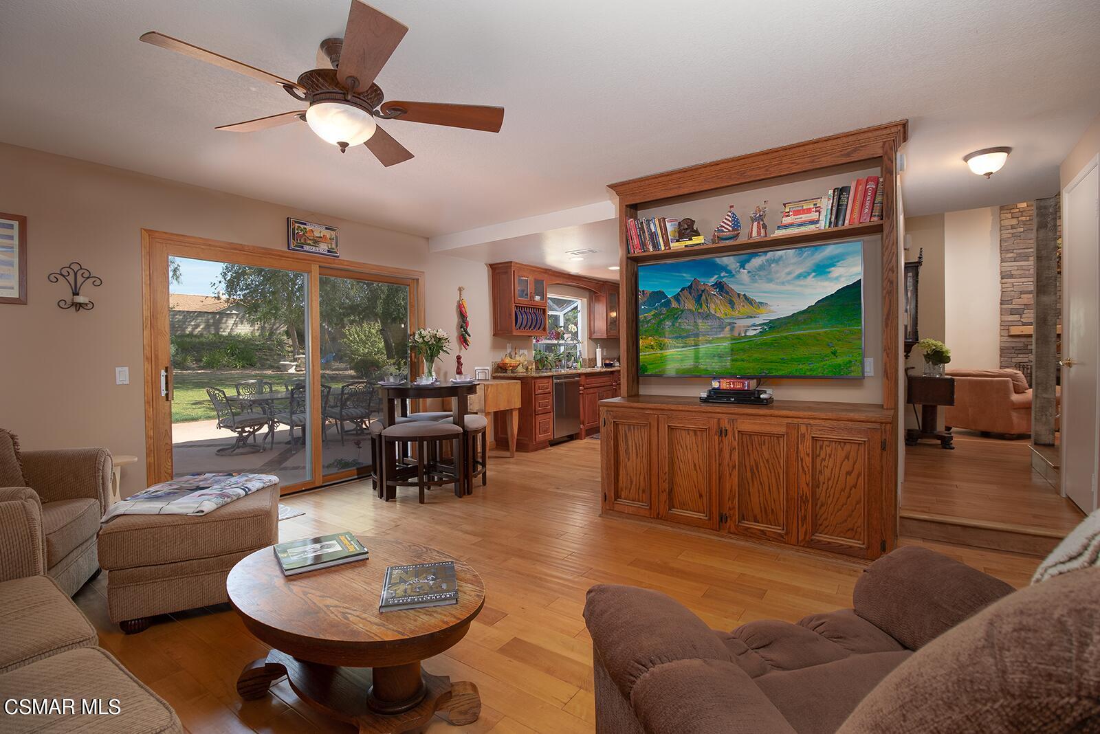 13339 Peach Hill Road Moorpark, CA 93021 - Photo 17 of 45 a living room with furniture and a flat screen tv