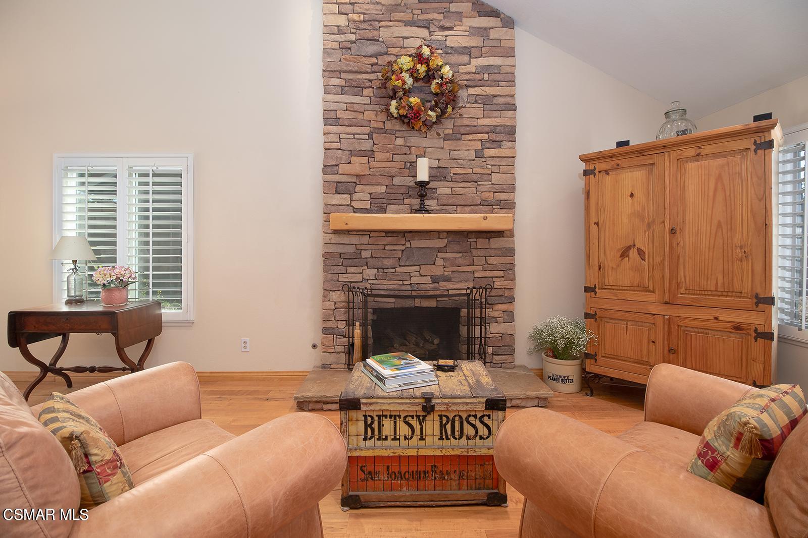13339 Peach Hill Road Moorpark, CA 93021 - Photo 4 of 45 a living room with furniture and a fireplace