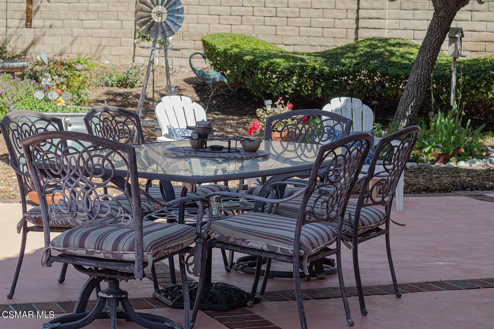 13339 Peach Hill Road Moorpark, CA 93021 - Photo 31 of 45 a view of a chairs and table in patio