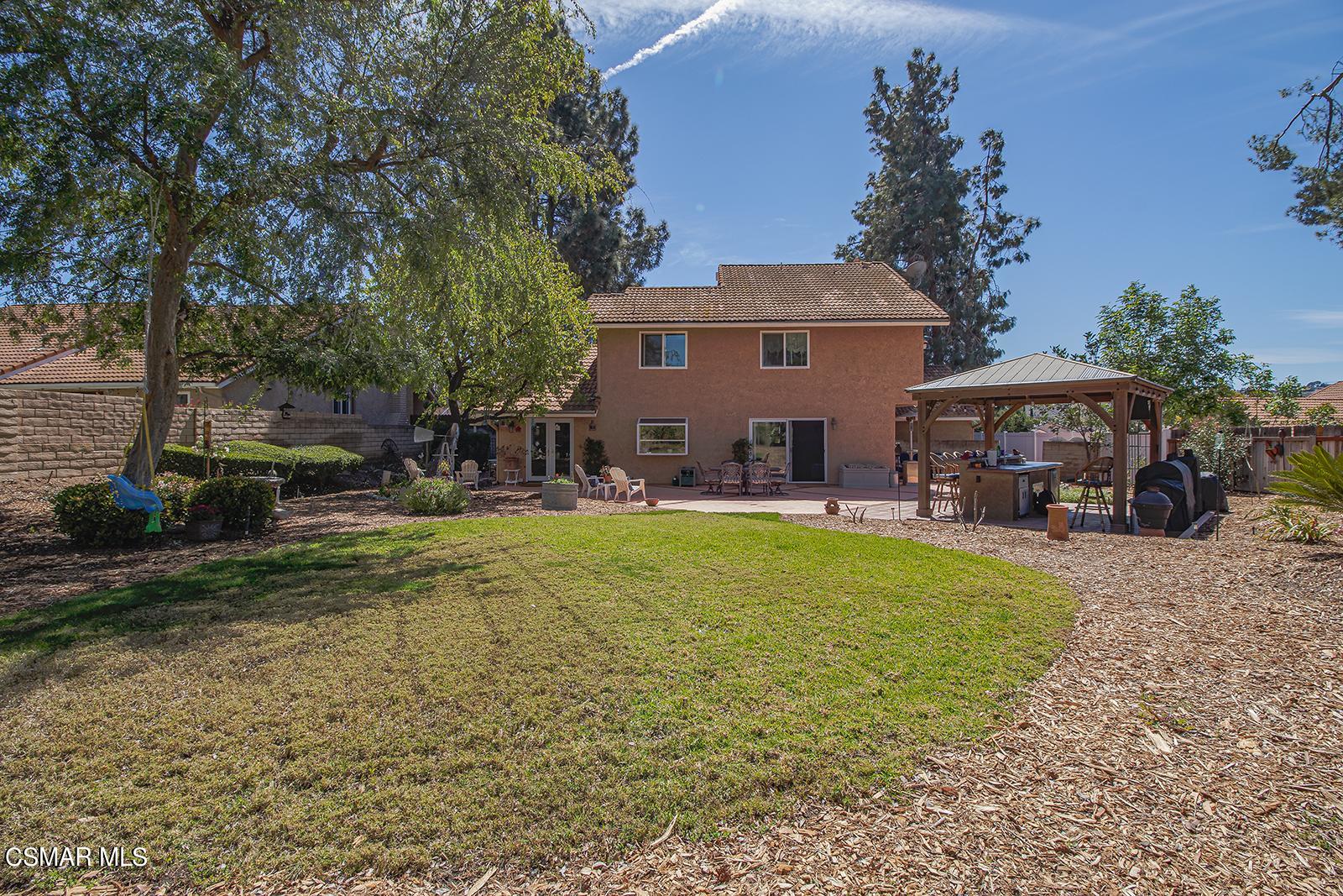 13339 Peach Hill Road Moorpark, CA 93021 - Photo 34 of 45 a view of a house with swimming pool and sitting area