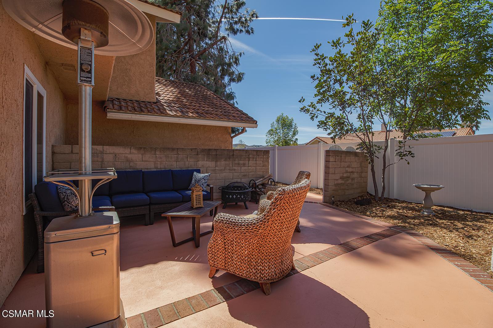 13339 Peach Hill Road Moorpark, CA 93021 - Photo 39 of 45 a patio with couches and a fire pit