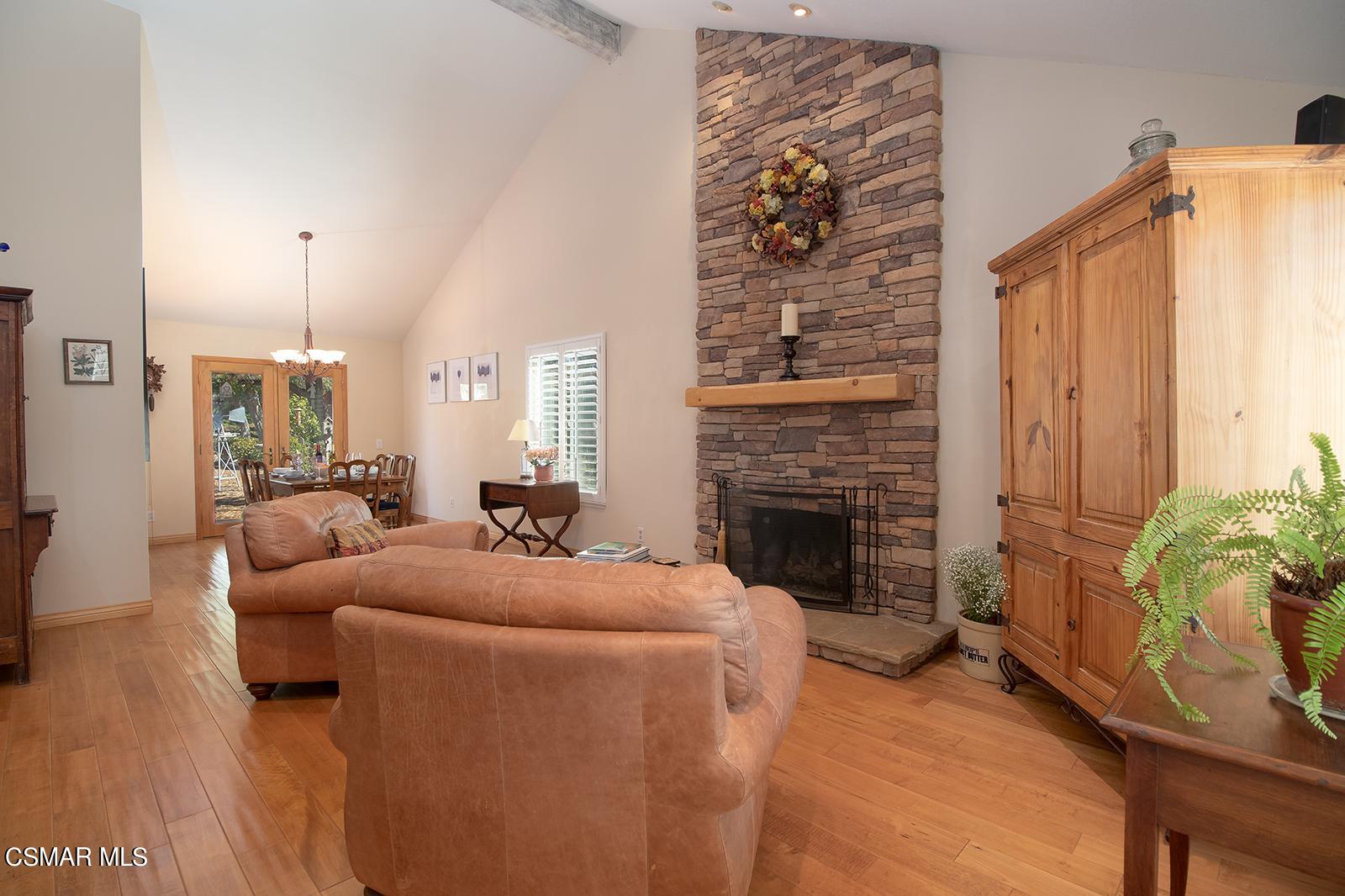 13339 Peach Hill Road Moorpark, CA 93021 - Photo 5 of 45 a living room with furniture and a fireplace