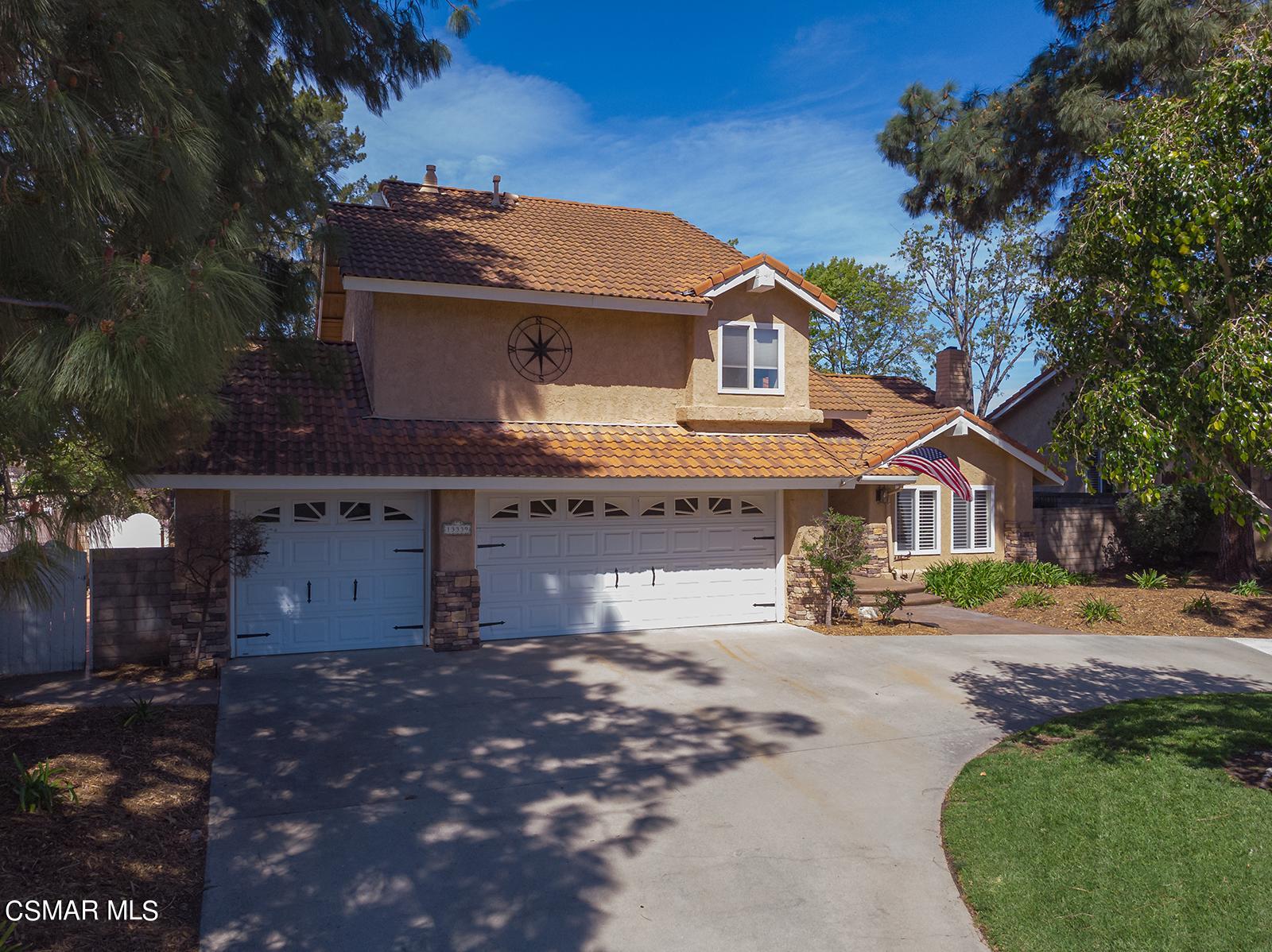 13339 Peach Hill Road Moorpark, CA 93021 - Photo 42 of 45 a front view of a house with a yard