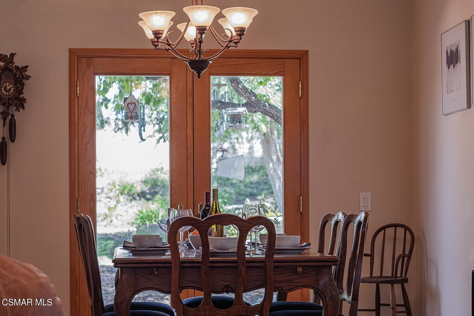 13339 Peach Hill Road Moorpark, CA 93021 - Photo 6 of 45 a view of a dining room with furniture window and outside view