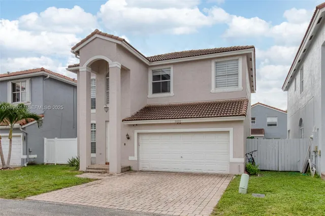 a house view with a outdoor space
