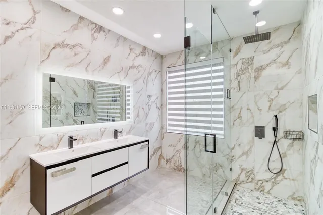 a view of an house with swimming pool and sitting area