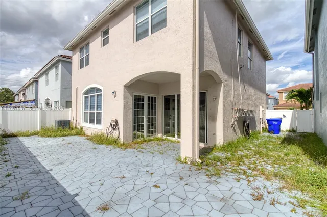 a view of swimming pool with a yard