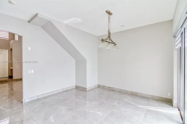 a view of a room with a hallway