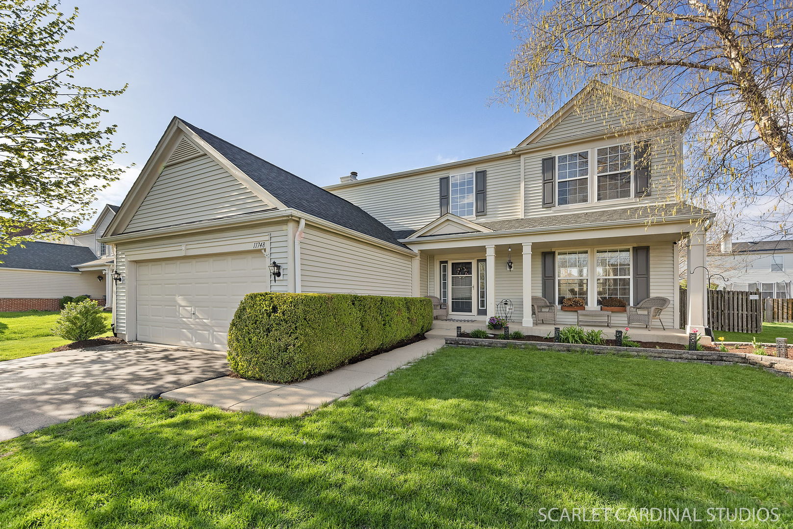 11748 Glenn Circle Plainfield, IL 60585 - Photo 1 of 24 front view of a house with a yard