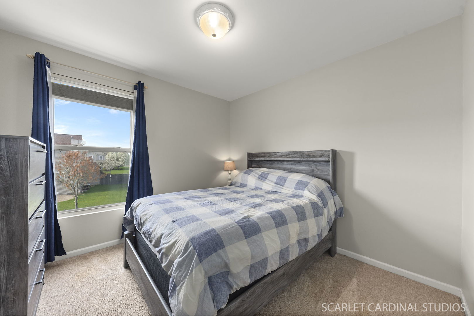 11748 Glenn Circle Plainfield, IL 60585 - Photo 18 of 24 a large bed sitting in a bedroom next to a window