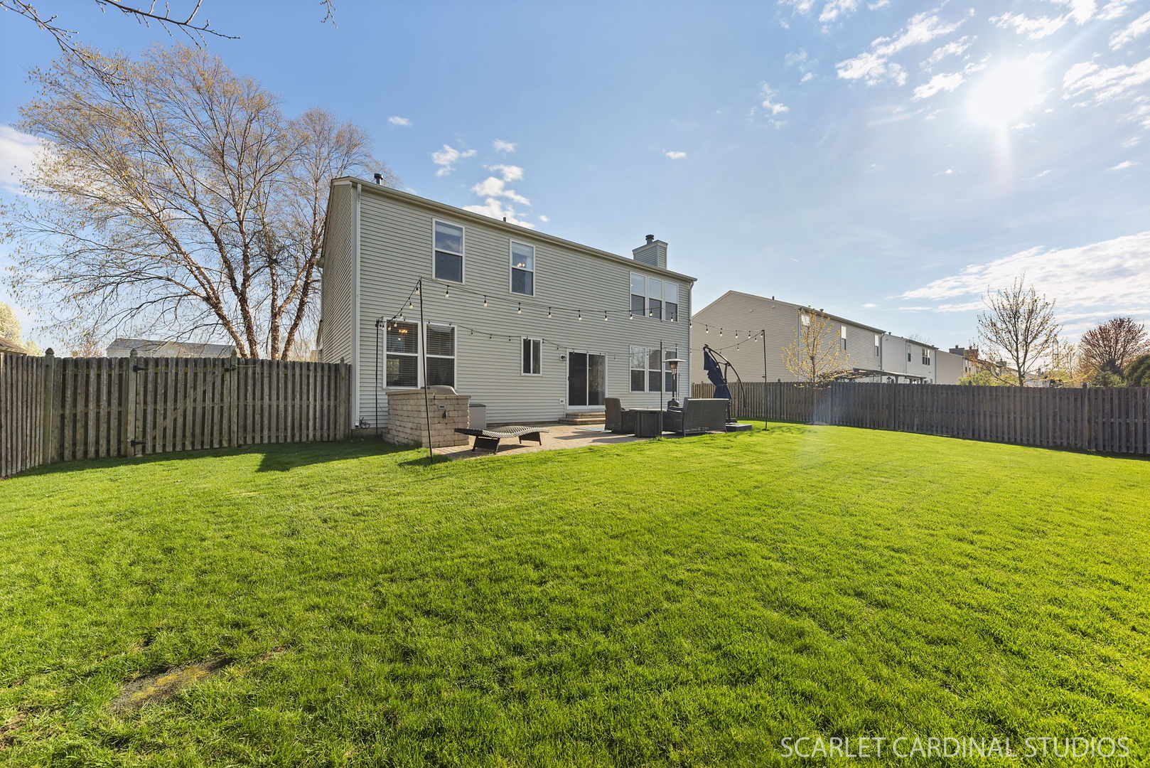 11748 Glenn Circle Plainfield, IL 60585 - Photo 24 of 24 a view of a house with backyard and tree