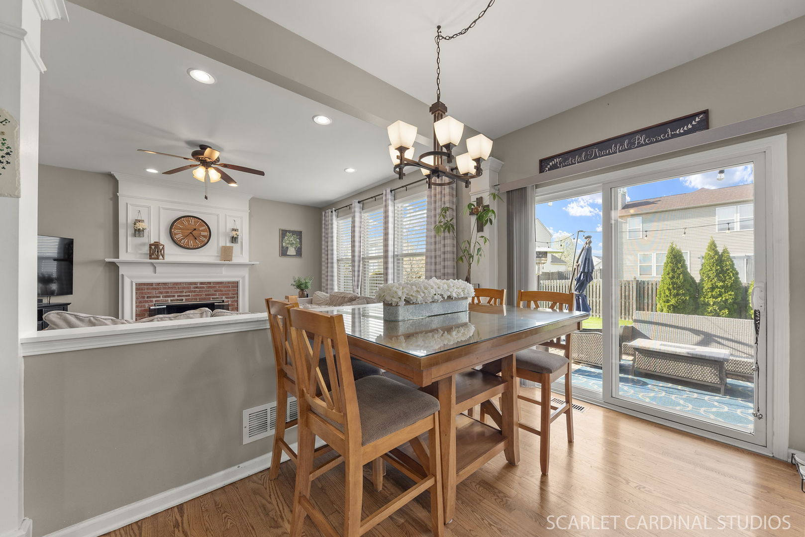 11748 Glenn Circle Plainfield, IL 60585 - Photo 6 of 24 a view of a dining room with furniture window and wooden floor