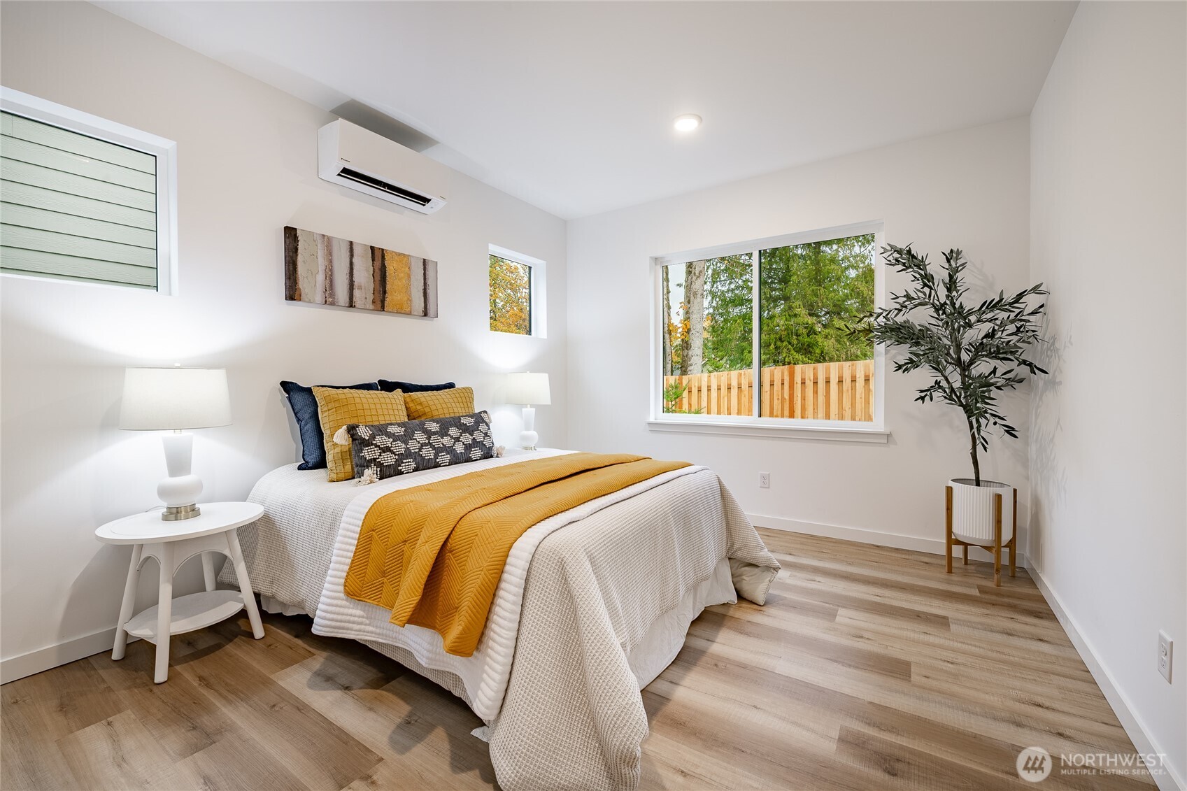 2992 Cedar View Road Blaine, WA 98230 - Photo 18 of 39 a bedroom with a bed and a potted plant