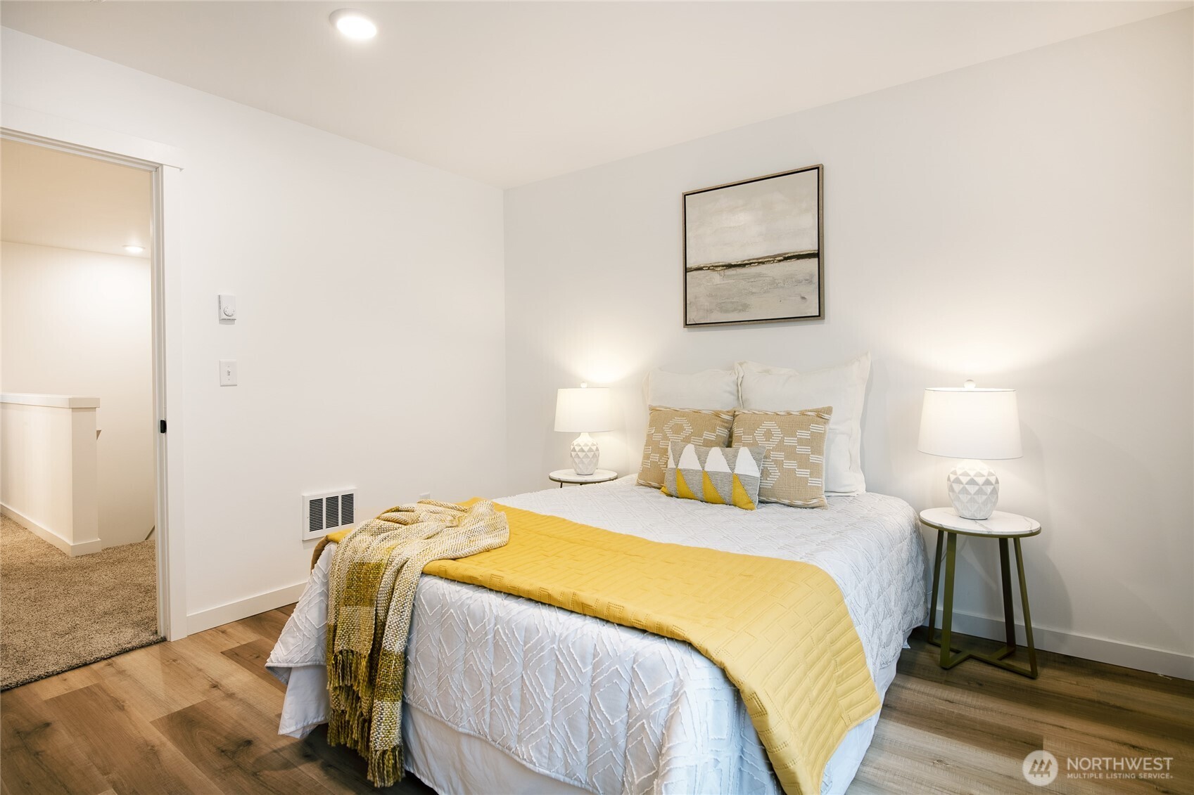 2992 Cedar View Road Blaine, WA 98230 - Photo 21 of 39 a bedroom with a bed and a lamp on table