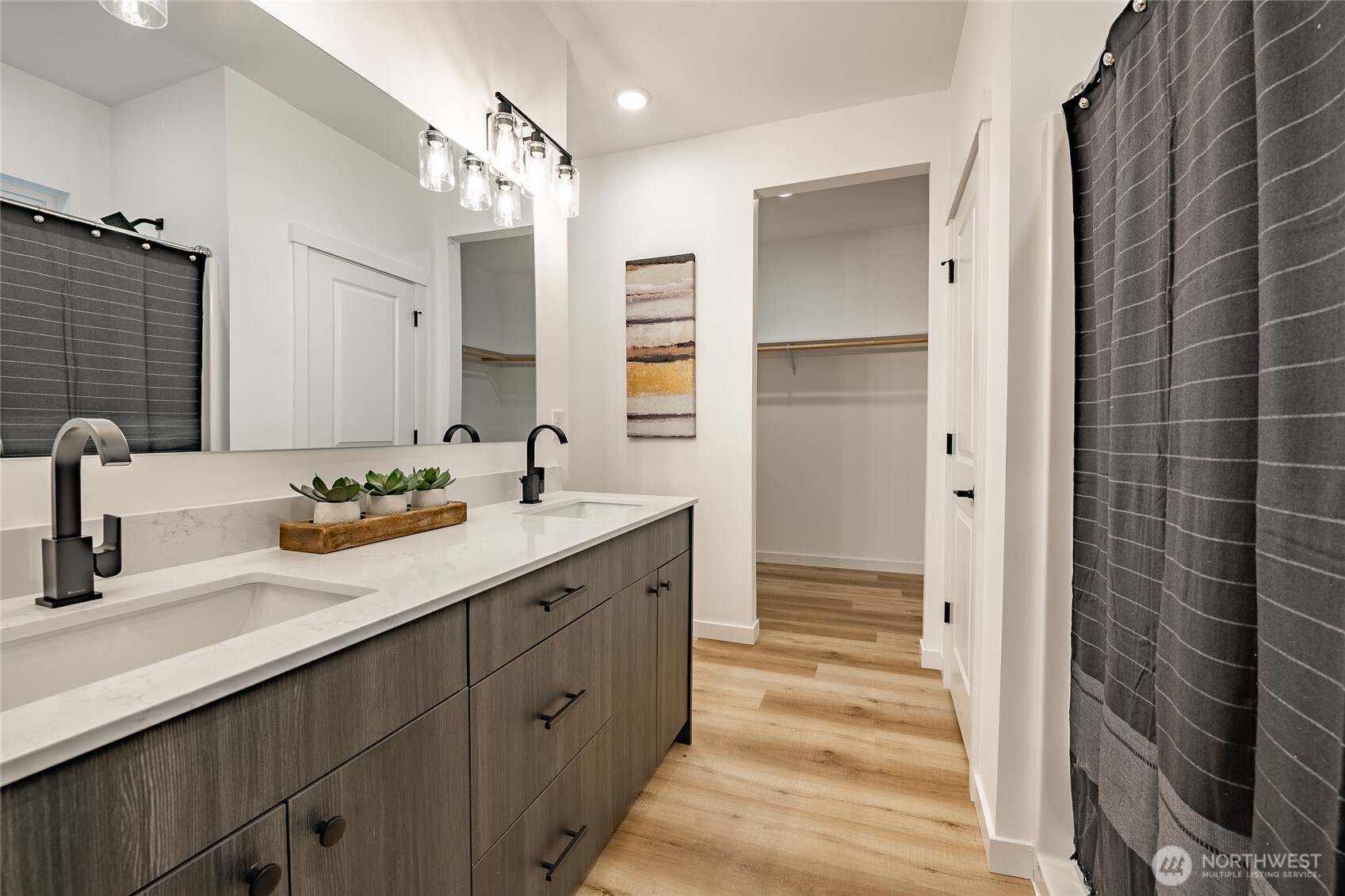 2992 Cedar View Road Blaine, WA 98230 - Photo 22 of 39 a bathroom with a double vanity sink a and a mirror