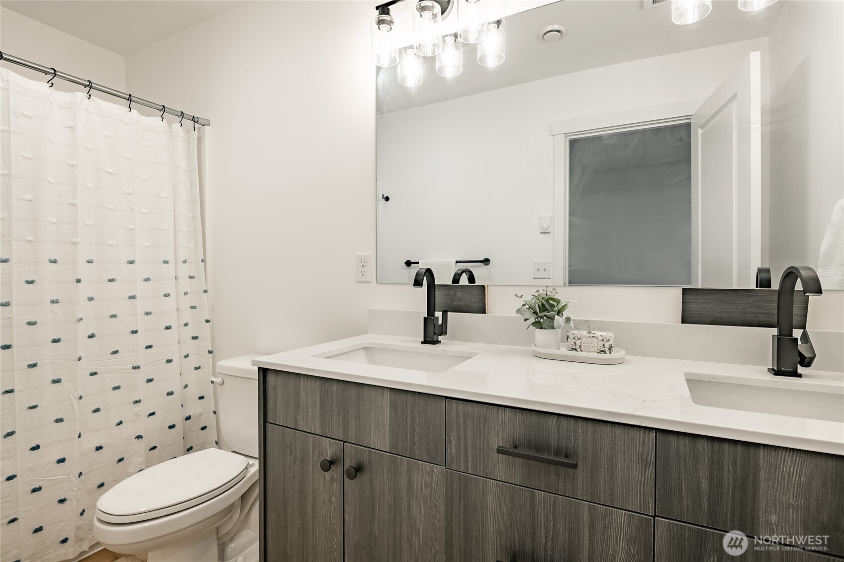 2992 Cedar View Road Blaine, WA 98230 - Photo 29 of 39 a bathroom with a sink a toilet a shower and a mirror