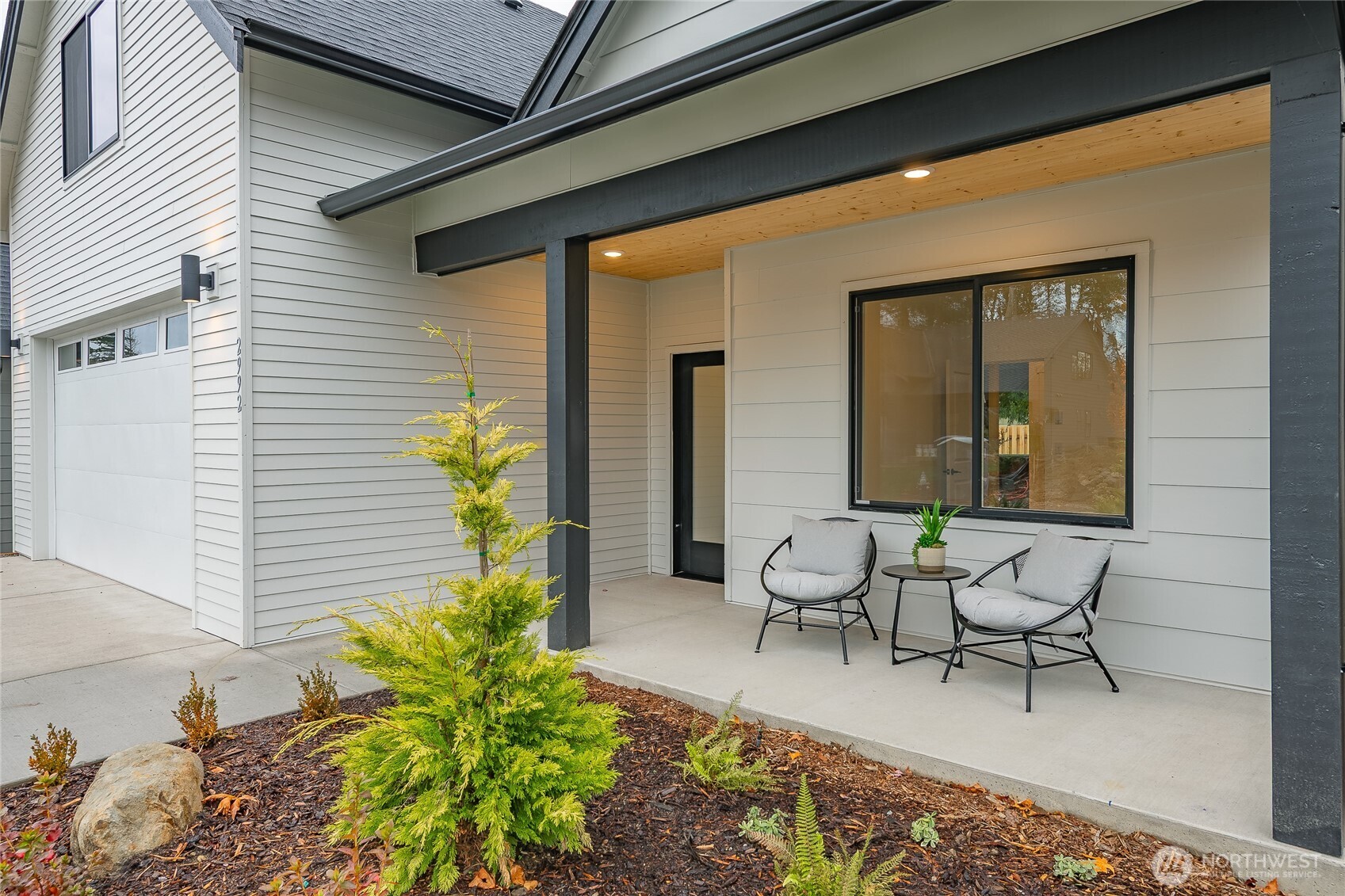 2992 Cedar View Road Blaine, WA 98230 - Photo 3 of 39 a house view with a seating space