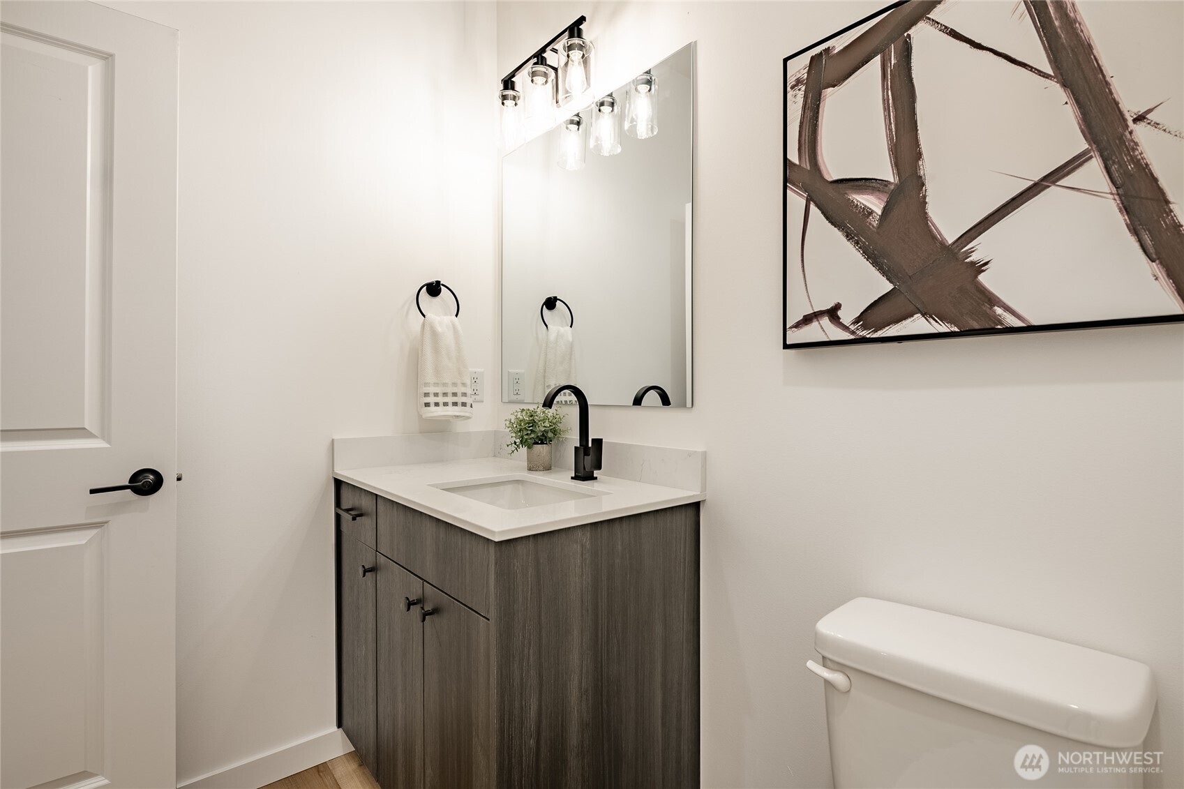 2992 Cedar View Road Blaine, WA 98230 - Photo 32 of 39 a bathroom with a toilet sink and mirror