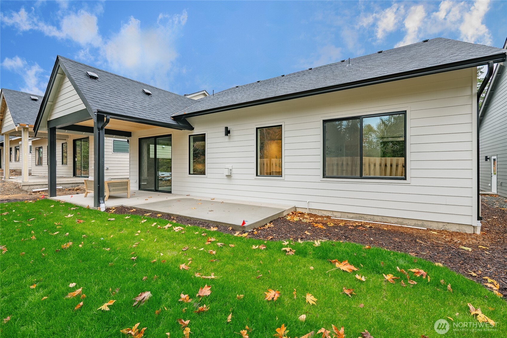 2992 Cedar View Road Blaine, WA 98230 - Photo 37 of 39 a view of a house with backyard and porch