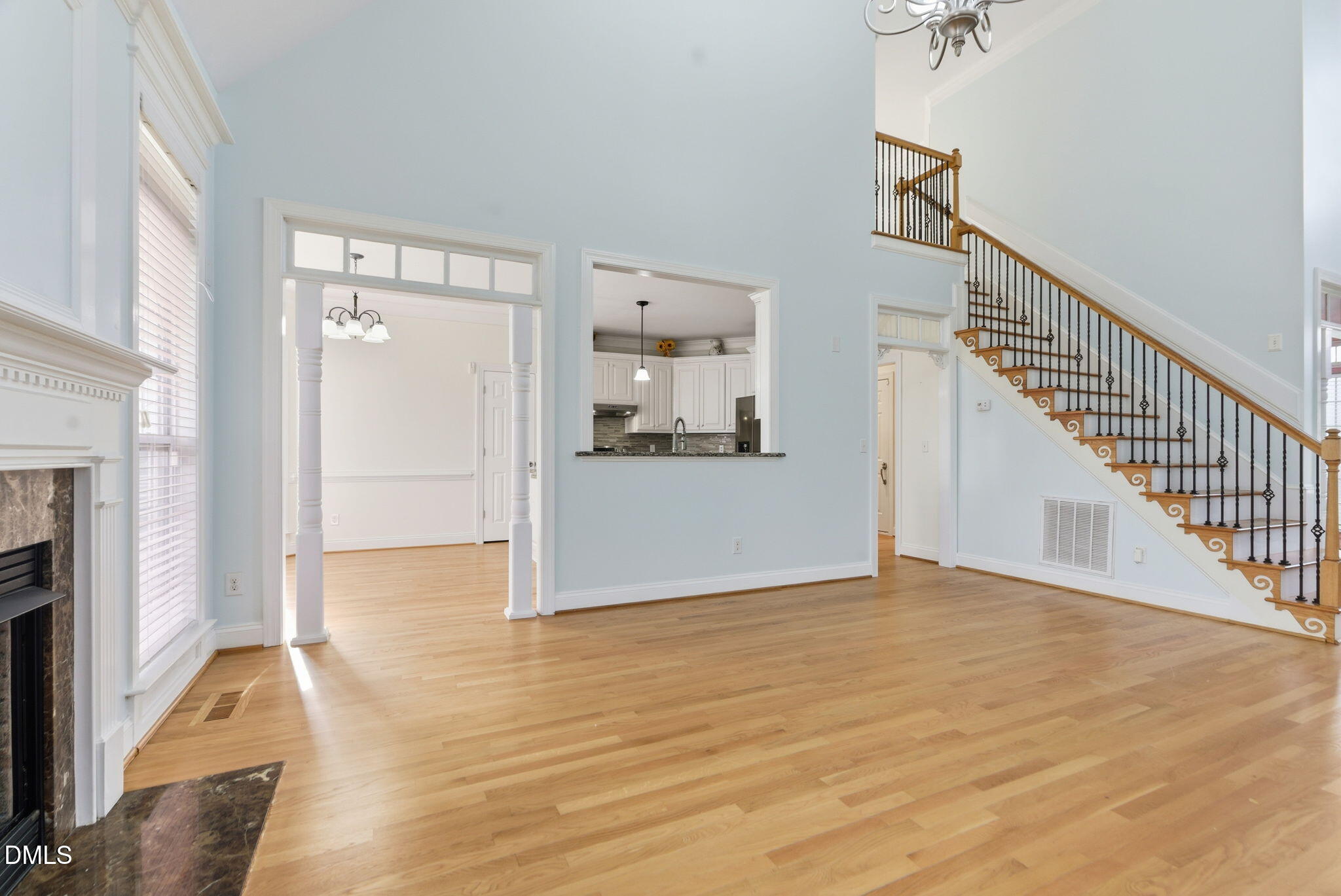 19 Silverside Drive Angier, NC 27501 - Photo 15 of 73 a view of a hallway with wooden floor and a living room