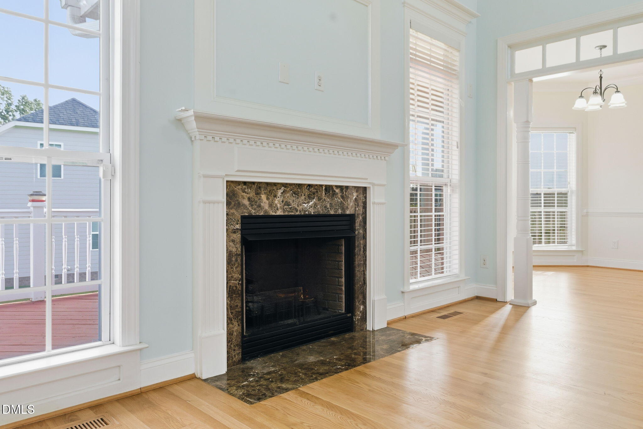 19 Silverside Drive Angier, NC 27501 - Photo 18 of 73 a view of an empty room with glass door and wooden floor