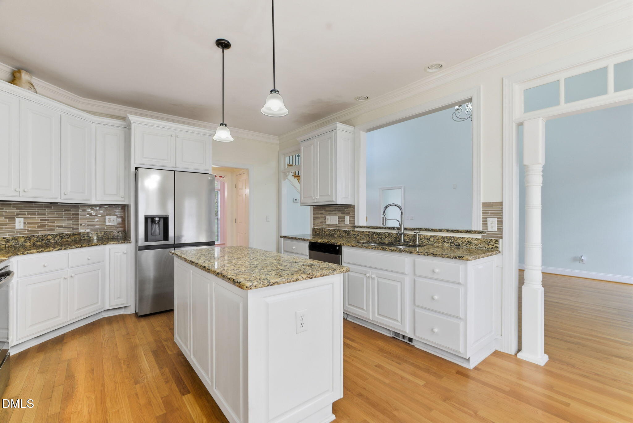 19 Silverside Drive Angier, NC 27501 - Photo 21 of 73 a kitchen with stainless steel appliances granite countertop a sink stove and refrigerator
