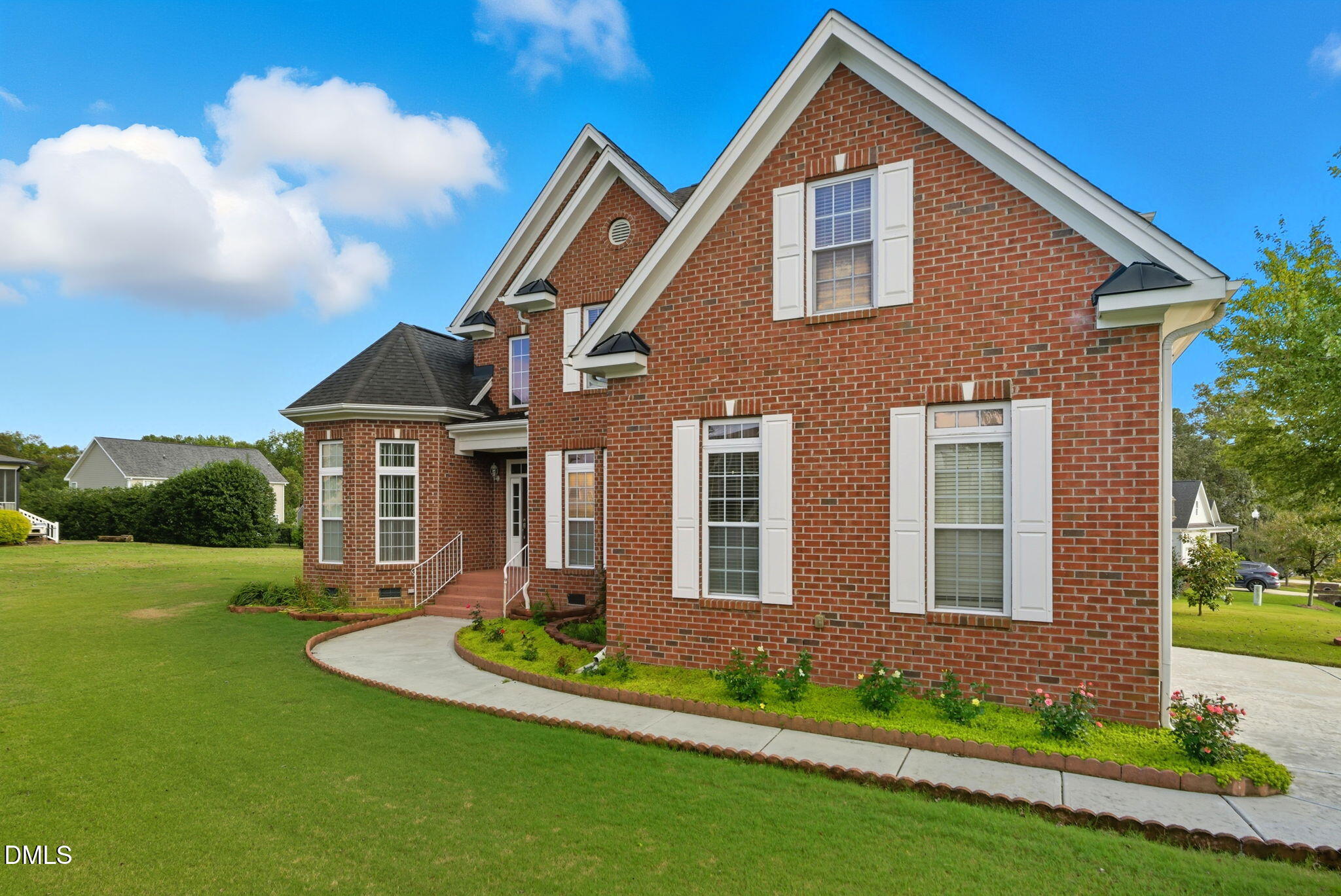 19 Silverside Drive Angier, NC 27501 - Photo 2 of 73 a front view of a house with a yard and garage