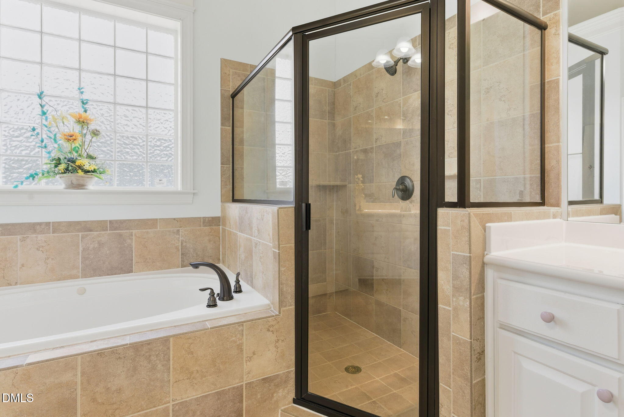 19 Silverside Drive Angier, NC 27501 - Photo 31 of 73 a bathroom with a bathtub and a shower