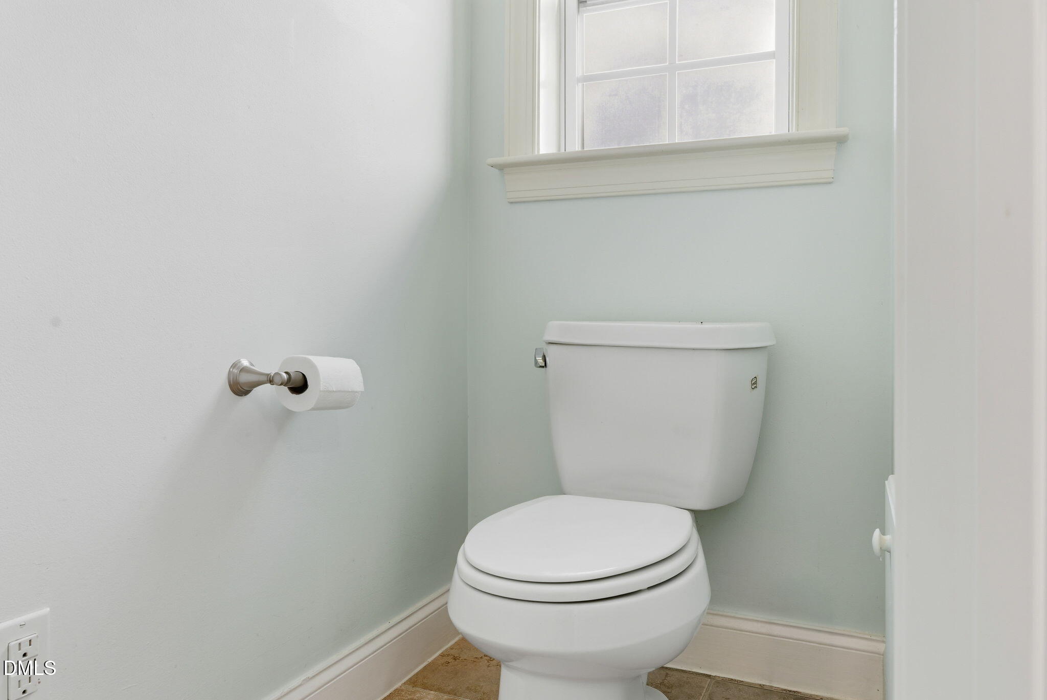 19 Silverside Drive Angier, NC 27501 - Photo 34 of 73 a white toilet sitting next to a window