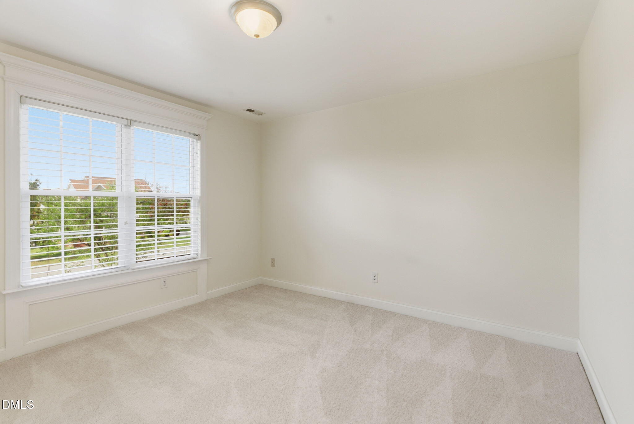 19 Silverside Drive Angier, NC 27501 - Photo 40 of 73 a view of an empty room with a window