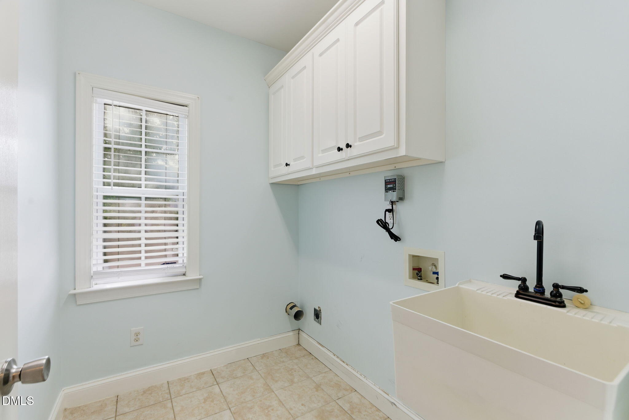 19 Silverside Drive Angier, NC 27501 - Photo 53 of 73 a bathroom with a window