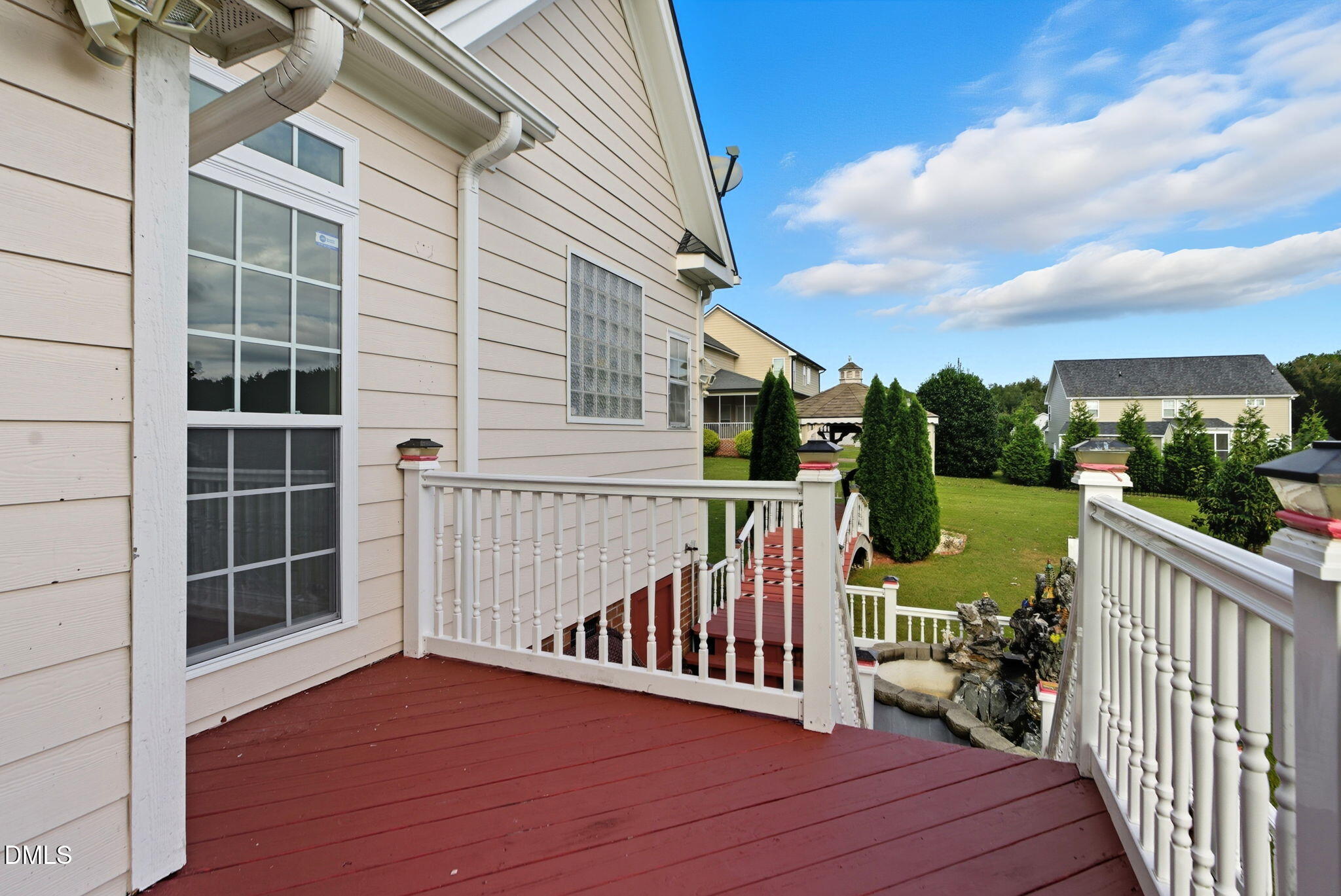 19 Silverside Drive Angier, NC 27501 - Photo 63 of 73 a view of a deck with wooden floor and fence with a barbeque