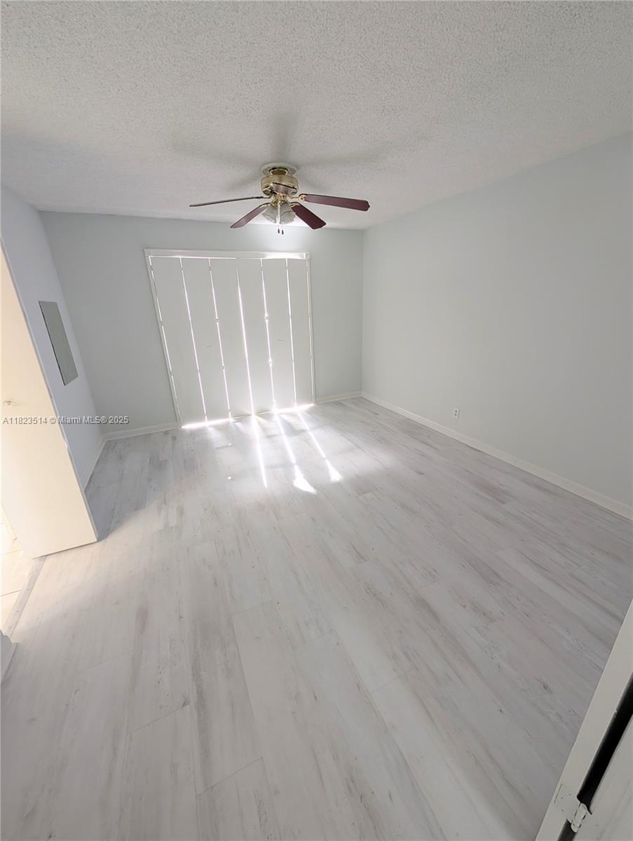14901 Southwest 4th Street, Unit 9A Pembroke Pines, FL 33027 - Photo 13 of 35 a view of a big room with carpet