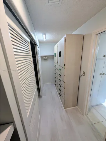 a view of bathroom with bathtub and shower