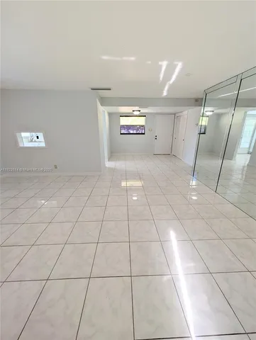 a view of a livingroom with an empty space