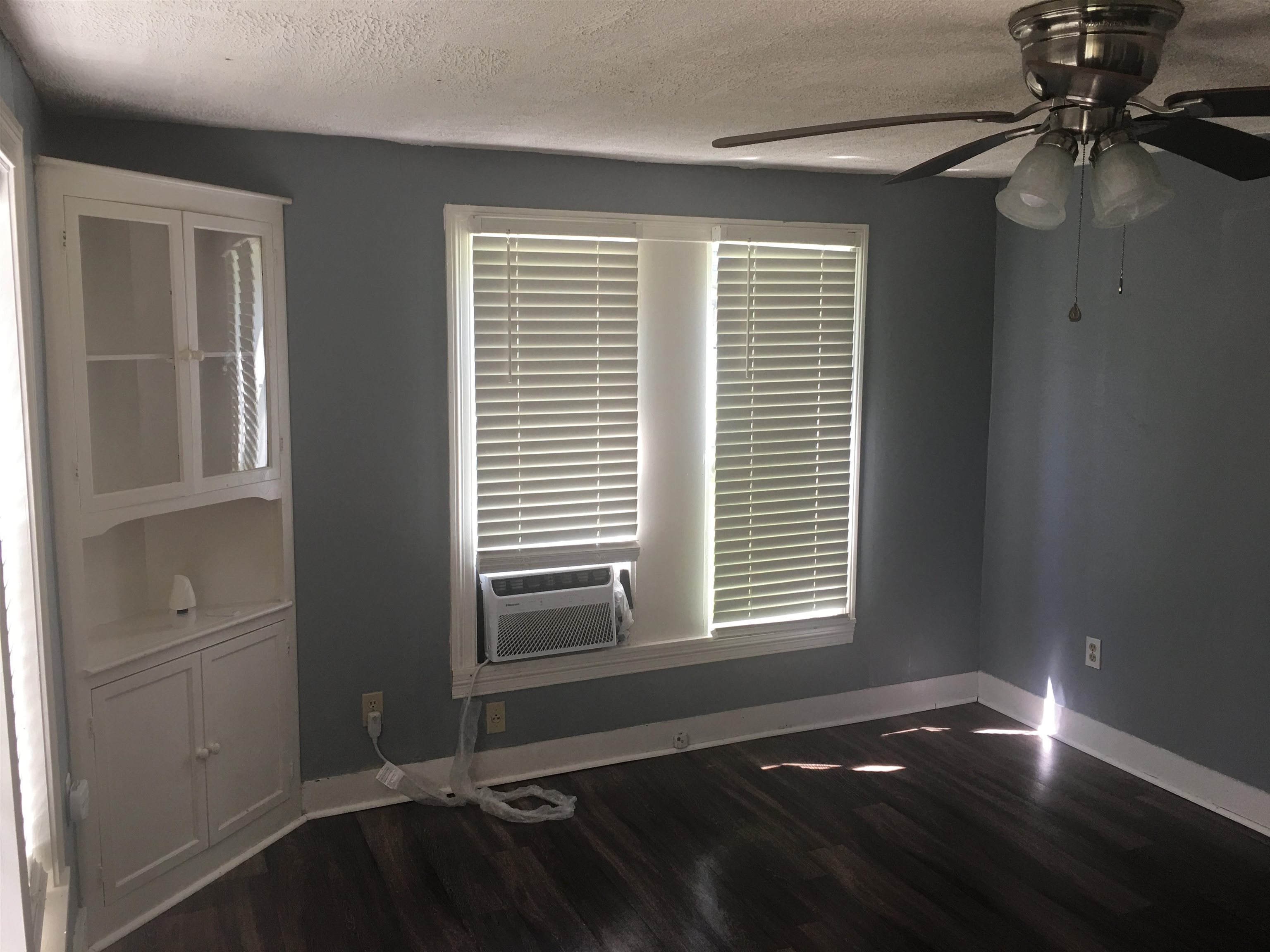 2965 Lotus Road Memphis, TN 38109 - Photo 3 of 14 a view of an empty room with a window