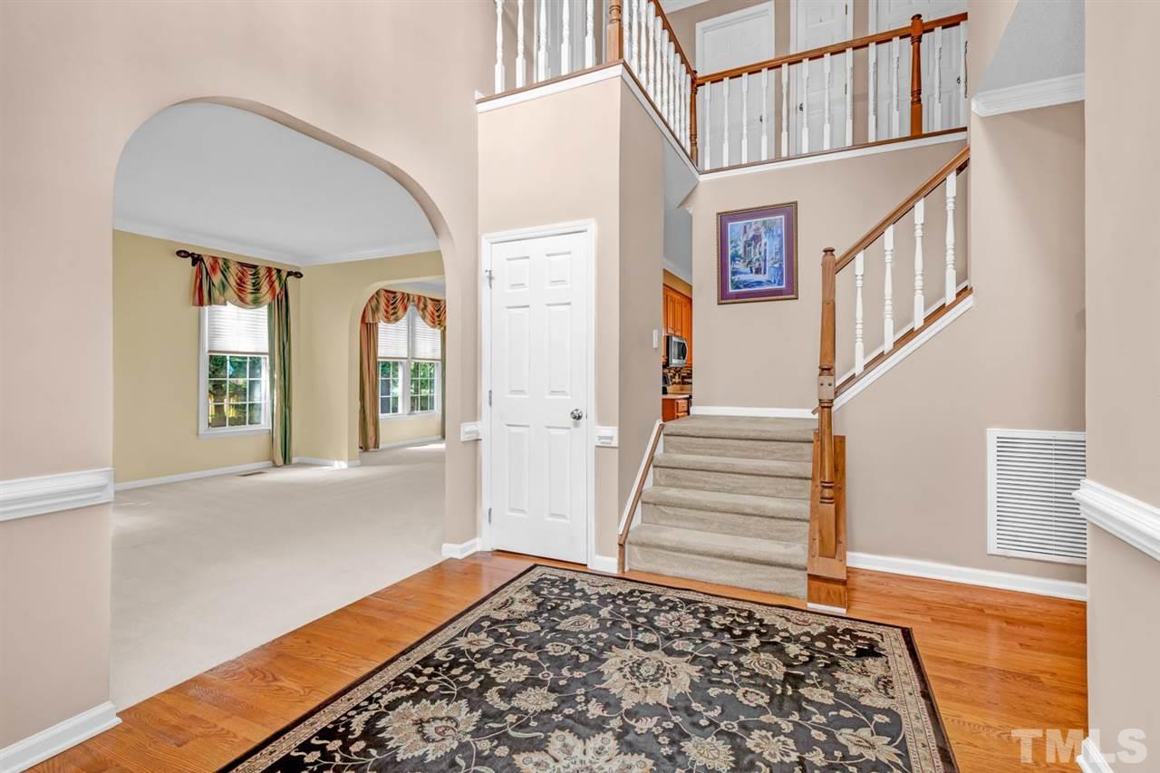 8601 Wheeling Drive Raleigh, NC 27615 - Photo 8 of 25 front view of a house with a window