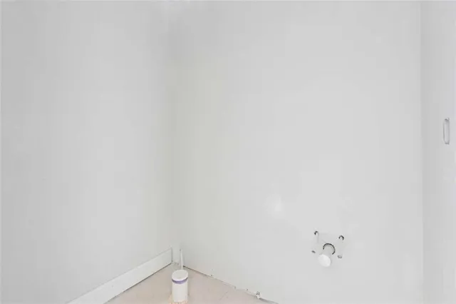 a view of a room that has window