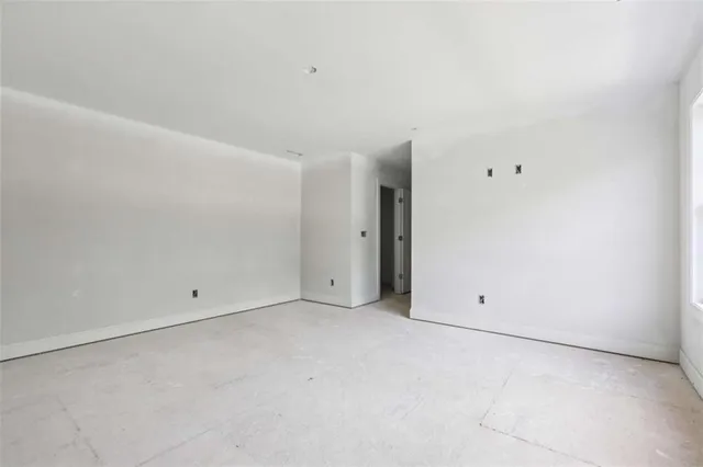 a bathroom with a white bathtub