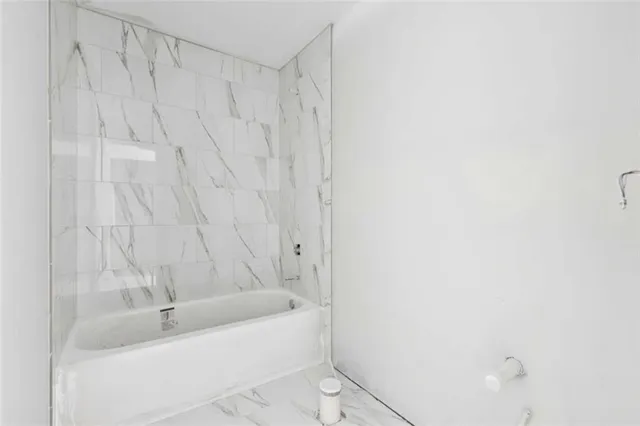 a view of a balcony with wooden floor