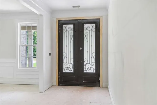an entryway with a door