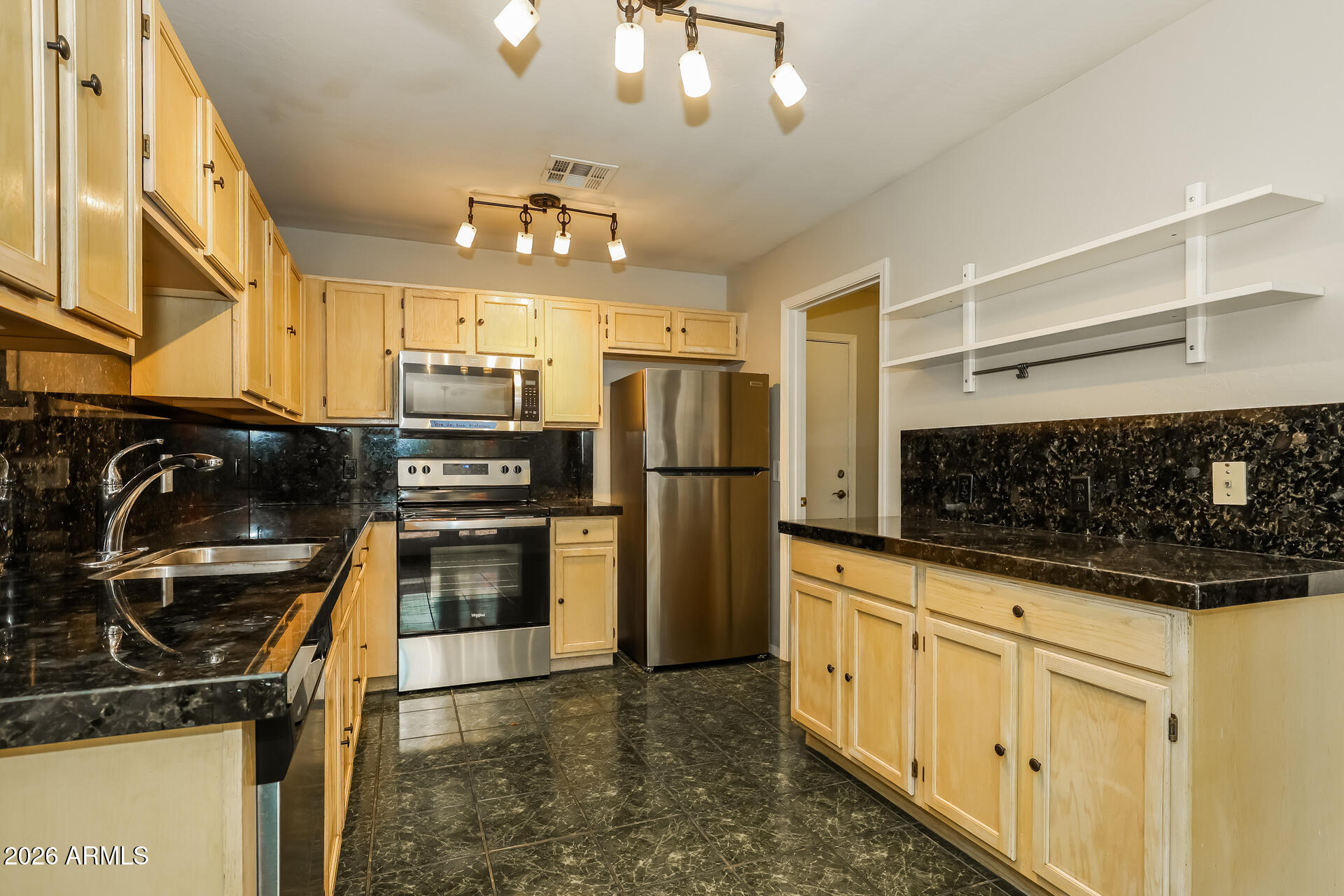 1653 East Vineyard Road Phoenix, AZ 85042 - Photo 9 of 21 009-photo-kitchen-15182435