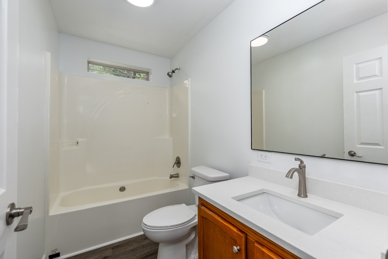 931 Highway 26 Magnolia, IL 61336 - Photo 14 of 35 a bathroom with a sink toilet vanity and shower