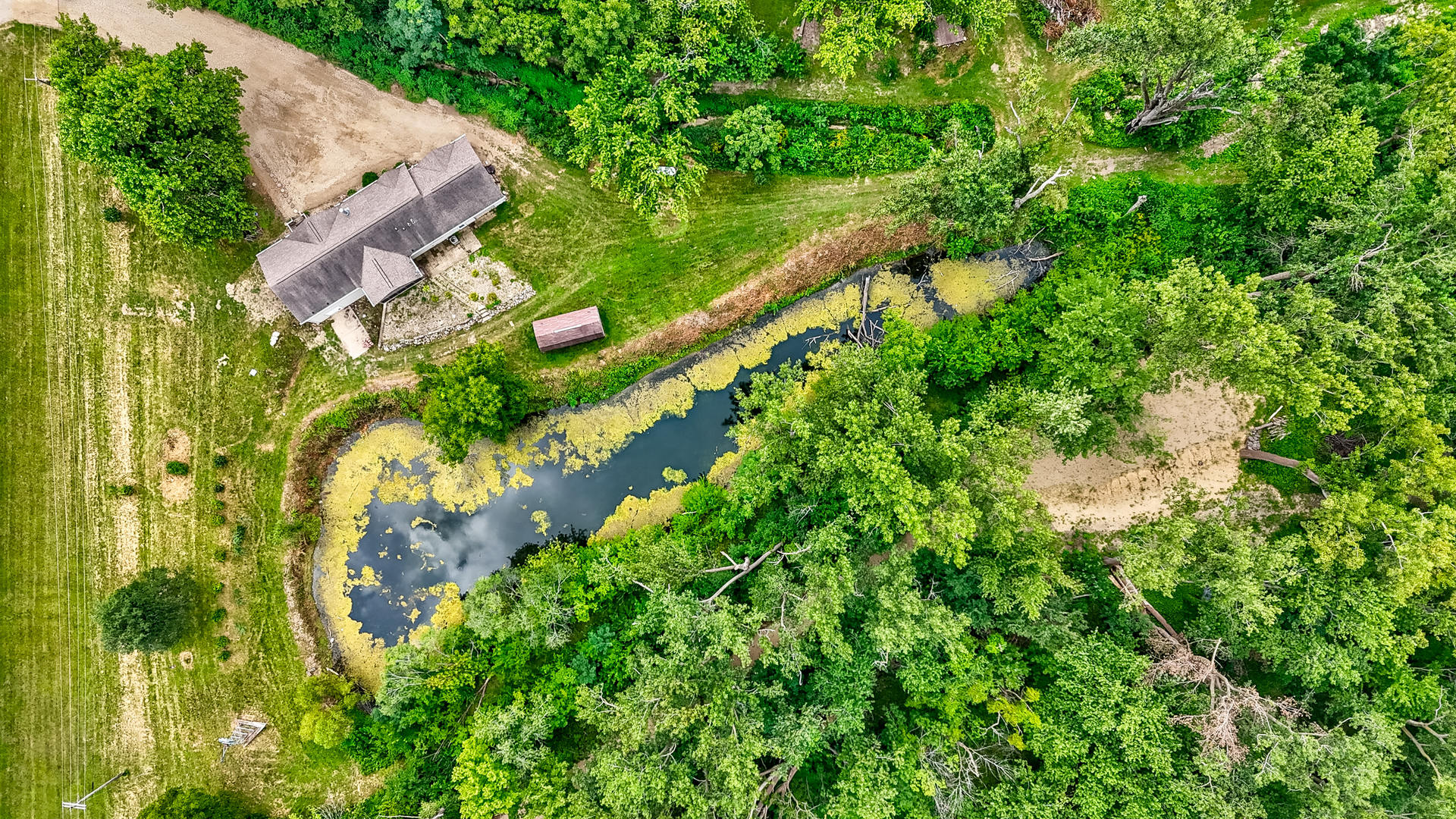 931 Highway 26 Magnolia, IL 61336 - Photo 3 of 35 an aerial view of residential houses with outdoor space and trees