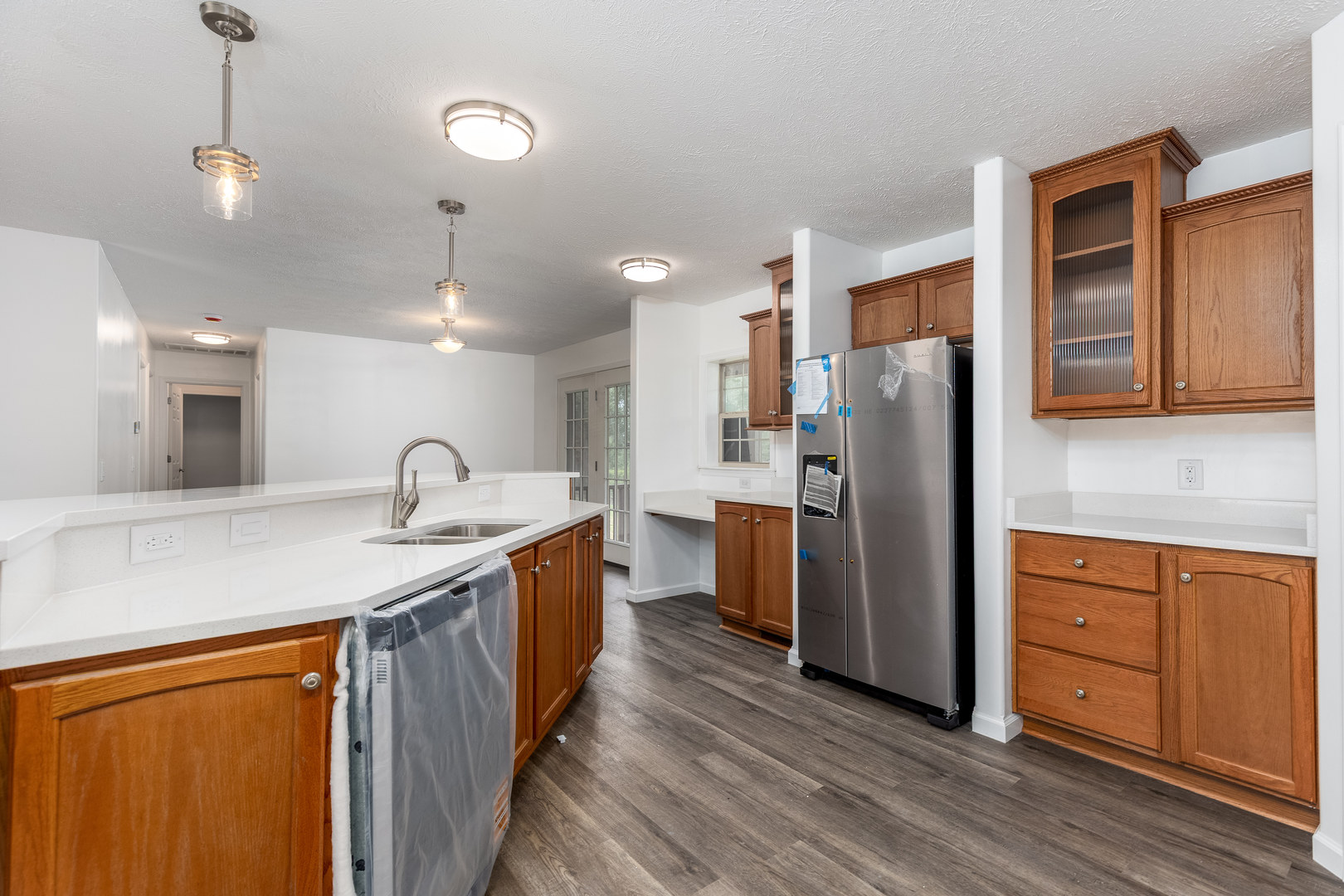931 Highway 26 Magnolia, IL 61336 - Photo 9 of 35 a kitchen with stainless steel appliances granite countertop a refrigerator a sink and a stove