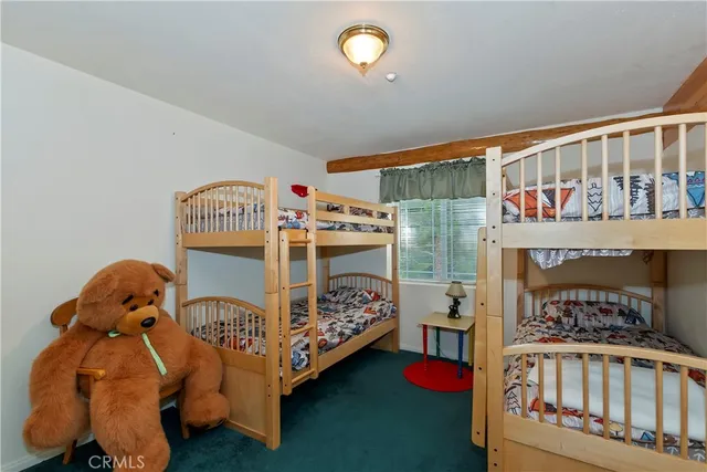 a view of a chairs and table on the wooden floor