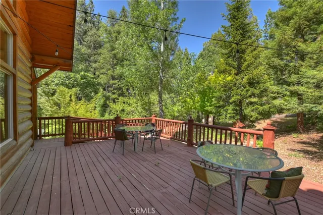 a view of a chairs and table on the wooden floor