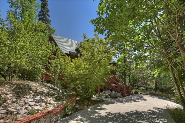a backyard of a house with lots of green space